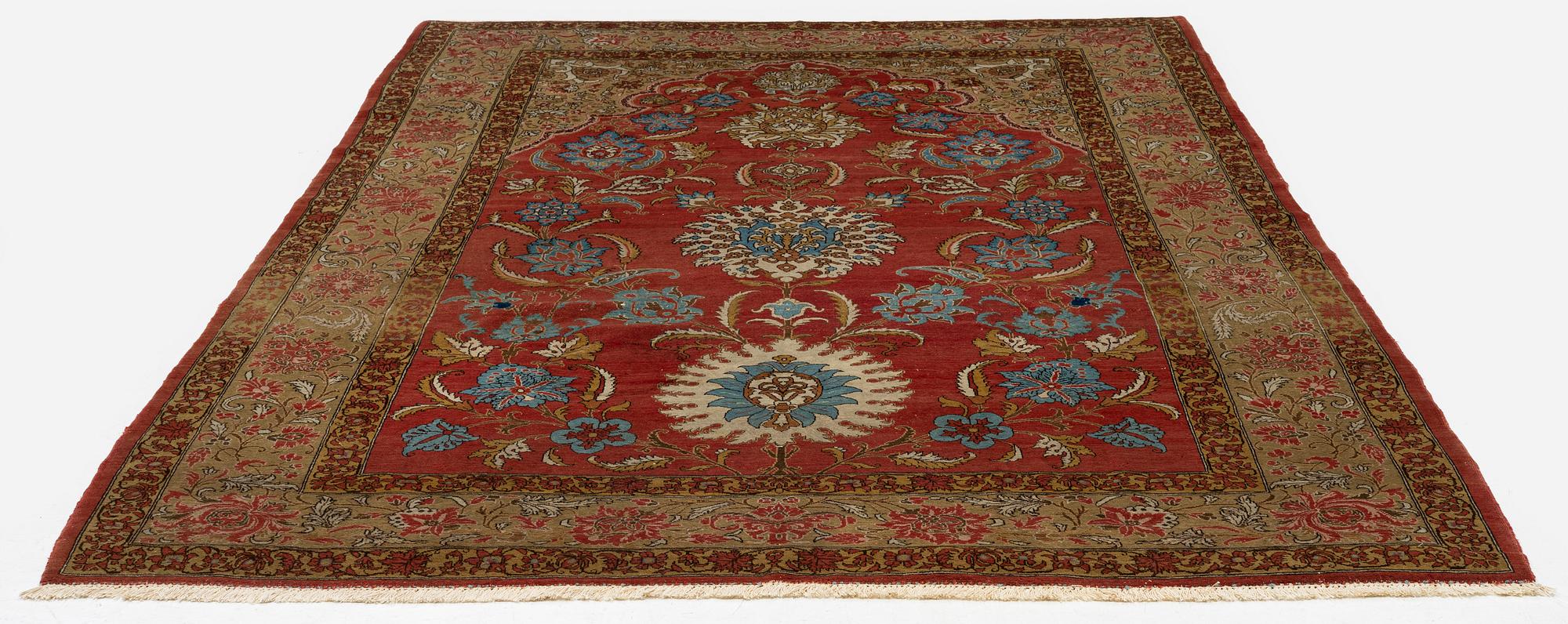 A Qum carpet, Central Persia, c. 310 x 190 cm.