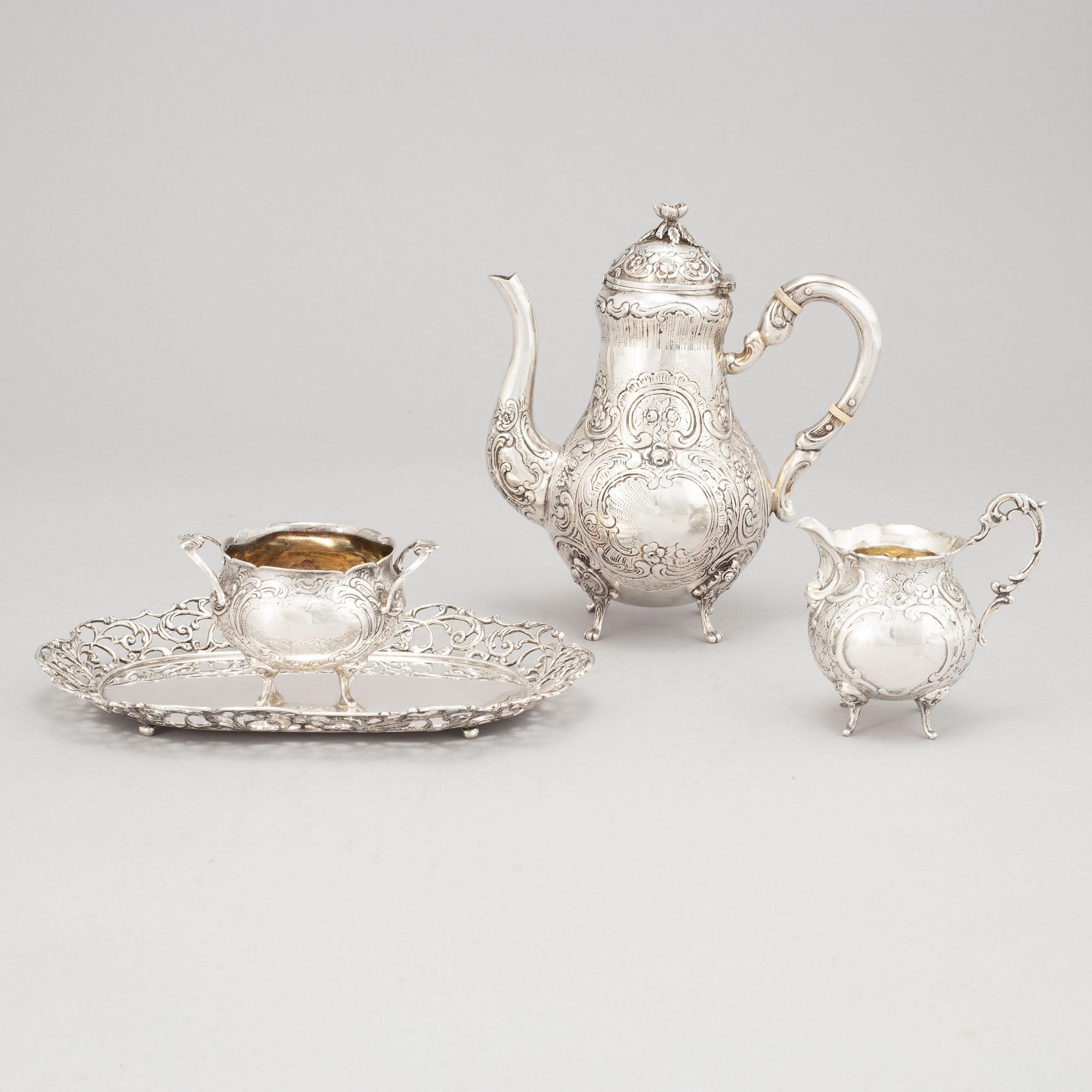 A silver mocha pot, creamer, sugar bowl and tray, some with mark of Gewe, Malmö 1950-51.