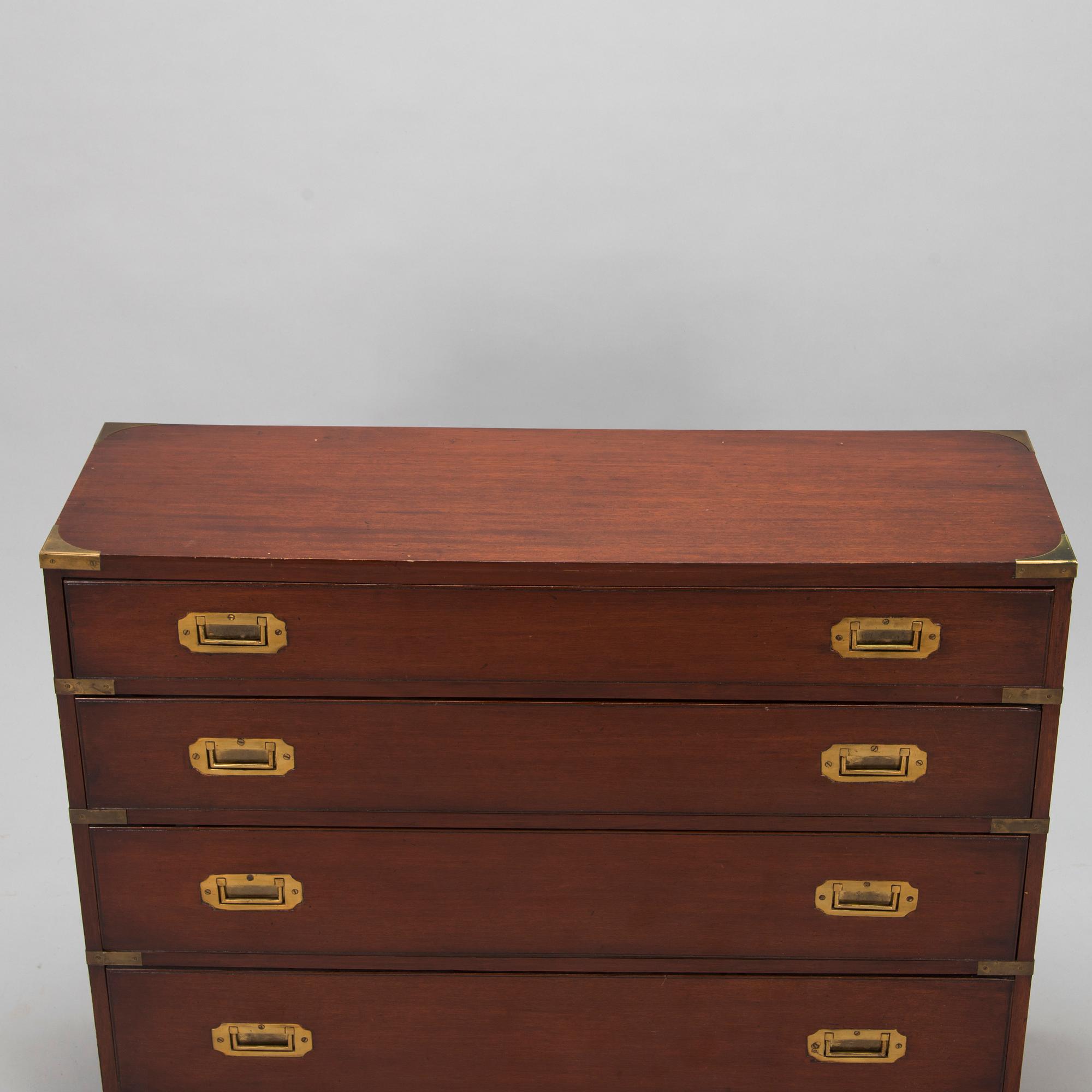 A chest of drawers, England, second half of the 20th century.