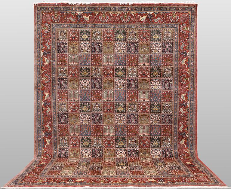 A Moud part silk carpet, 354 x 252 cm.