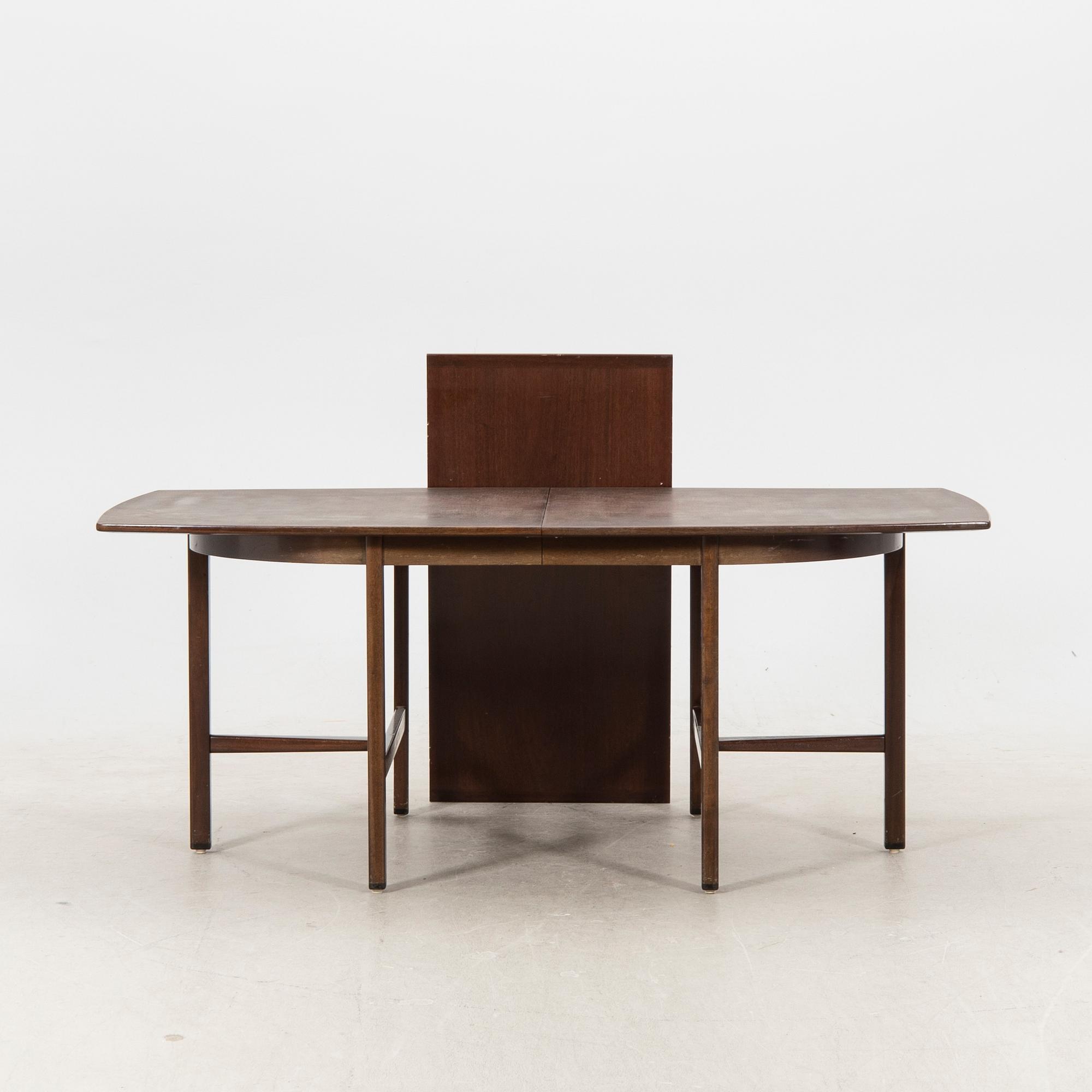 A table and four chairs in lacquered mahogany by David Rosén, "Triva-diné", middle of the 20th century.