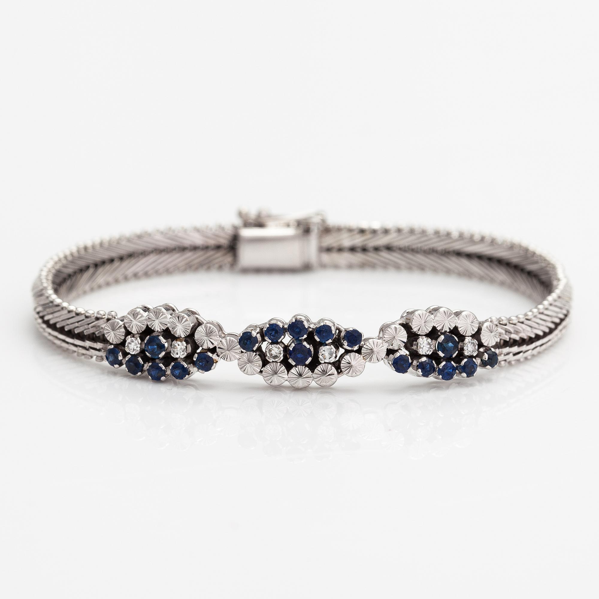 Rannekoru, 18K valkokultaa, safiireja ja timantteja n. 0.18 ct yht.