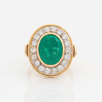 Emerald and brilliant-cut diamond ring.