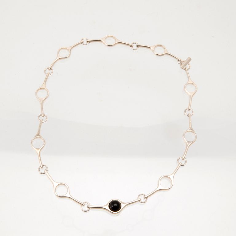Georg Jensen, "Sphere" necklace in silver with cabochon-cut onyx.