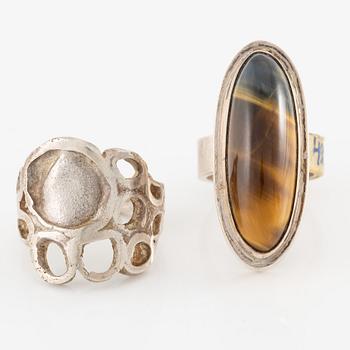 Lars Arby, fyra ringar, silver, en med tigeröga.
