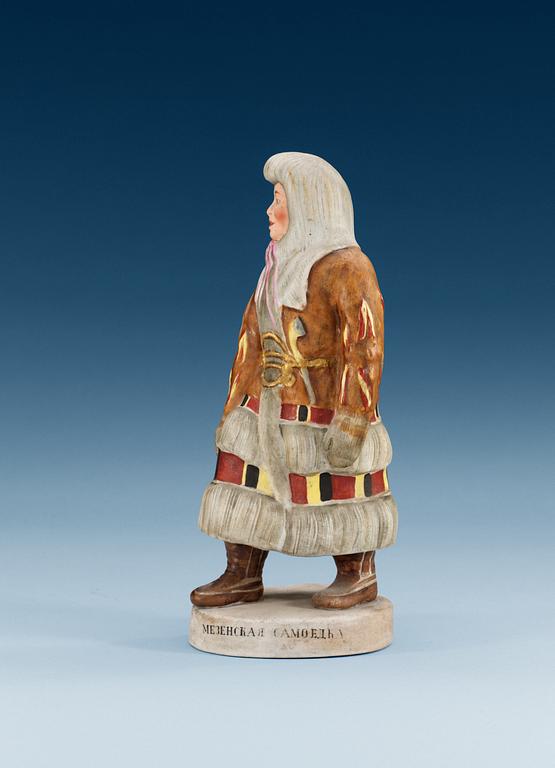 A Russian bisquit figure of a Samoyed woman from Mezen, Central Porcelain Trust, Dimitrovski, Verbilki, Moscow, 20th Century.