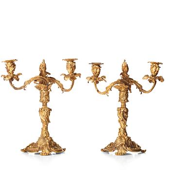 A pair of Neo-Rococo 1840's two-light gilt bronze candelabra.