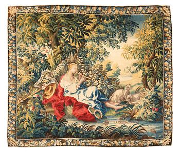 A tapestry, “La poesie pastoral”, tapestry weave, ca 251,5 x 283 cm, after Boucher, France 18th century.