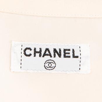Two Chanel Crepe de Chine Cream Coloured Silk Blouses.