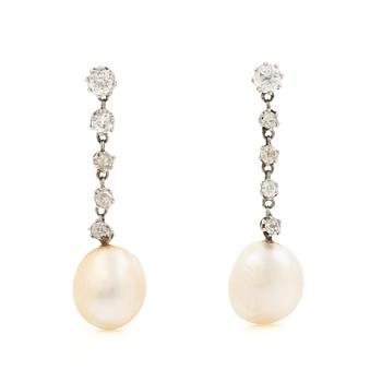 528A. A pair of  earrings in white gold with pearls and old-cut diamonds.