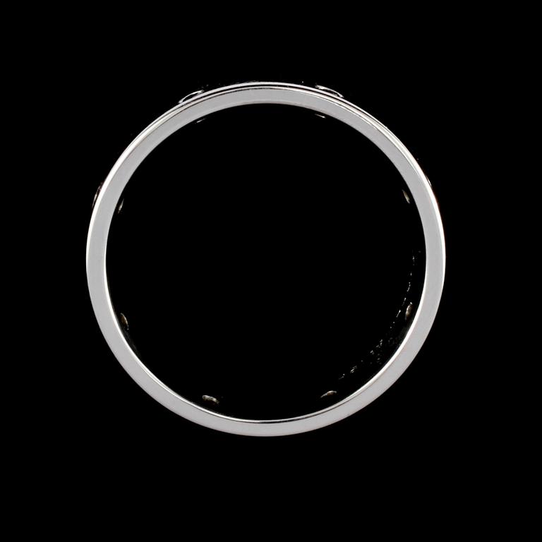 RING, 18k vitguld med 8 svarta briljantslipade diamanter, totalt 0.16 ct, Scahlins No1, Scahlins, Stockholm. Vikt 12 g.