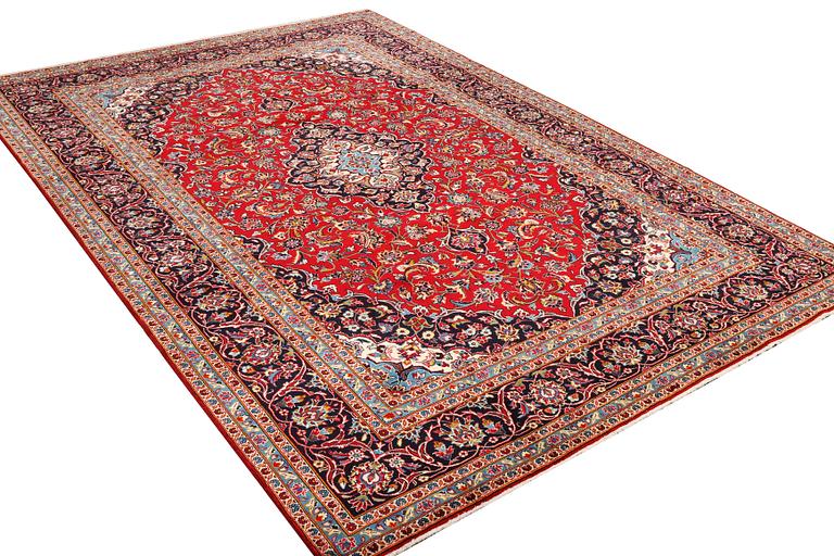 A Keshan carpet, c. 360 x 247 cm.