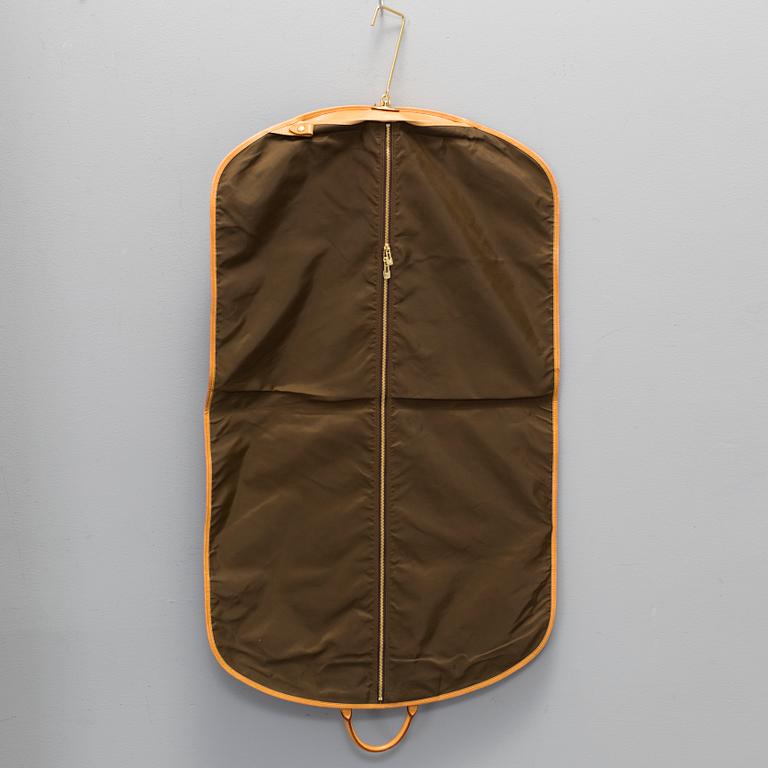 LOUIS VUITTON, a 'Housse Porte-Habits' garment bag.