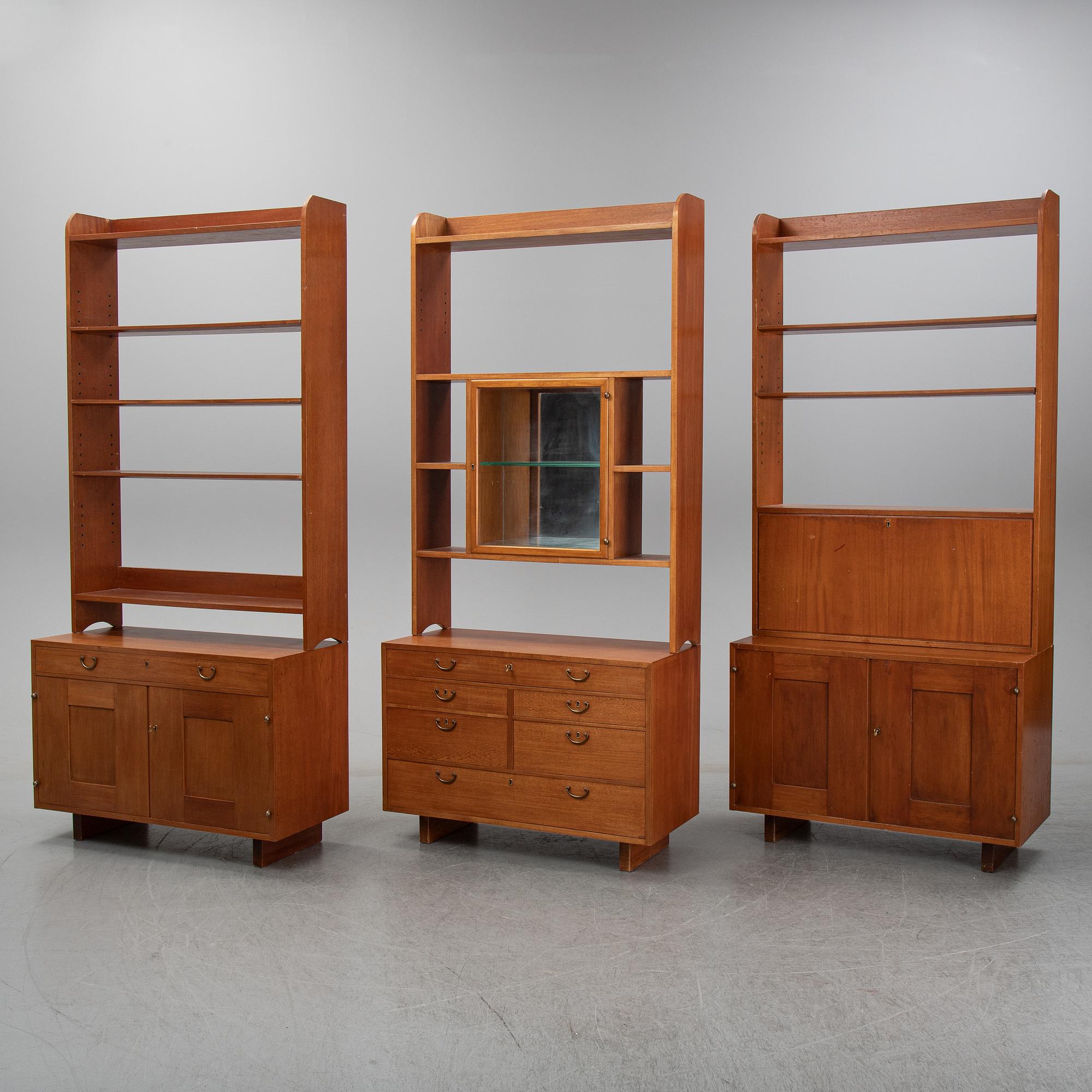 Josef Frank, a set of three mahogany bookcases, model 2112, Firma Svenskt Tenn.