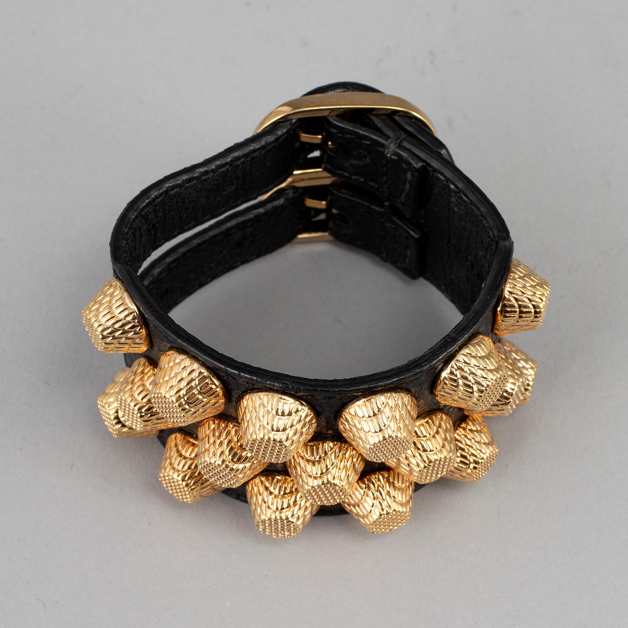 BALENCIAGA a studded leather bracelet. Bukowskis