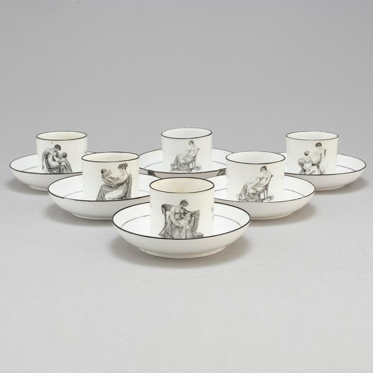 Six soft paste cups with saucers, early 19th century.