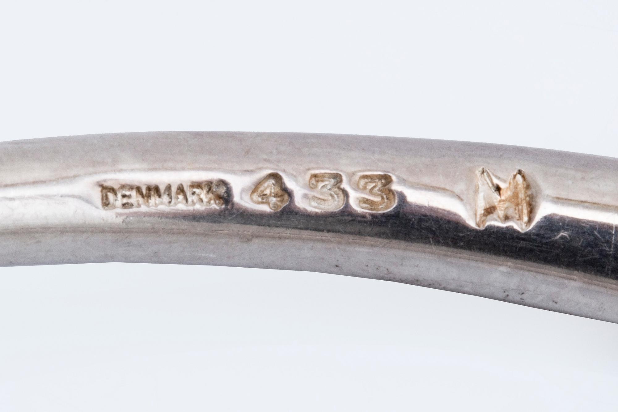 Bangle, Georg Jensen, "Offspring" sterling silver, ca 50 g, innercircumference approx 19 cm.