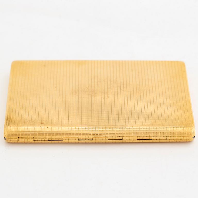 18K gold cigarette case.