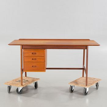 A writing desk, designed by Arne Vodder for Vamo Møbelfabrik, third quarter of the 20th century.