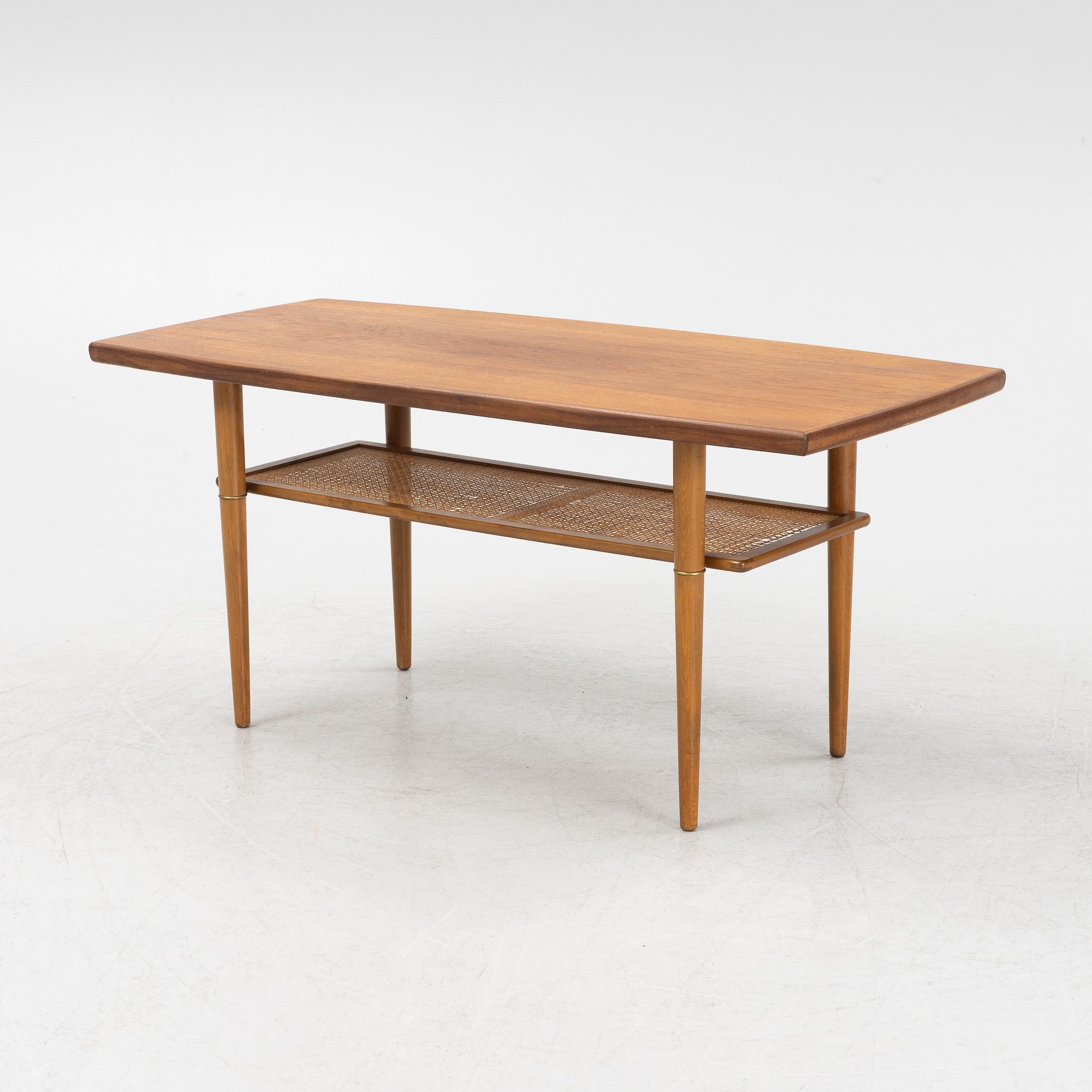 A 1960s teak coffee table.