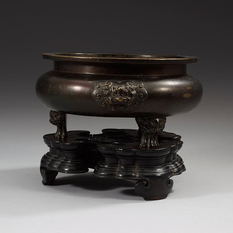 A large bronze tripod censer, Ming dynasty (1368-1644), with Xuande six character mark.