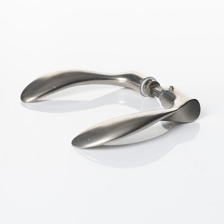 Arne Jacobsen, a door handle 'AJ-Grebet' for SAS Royal Hotel, Copenhagen 1956, executed by Carl F Petersen.