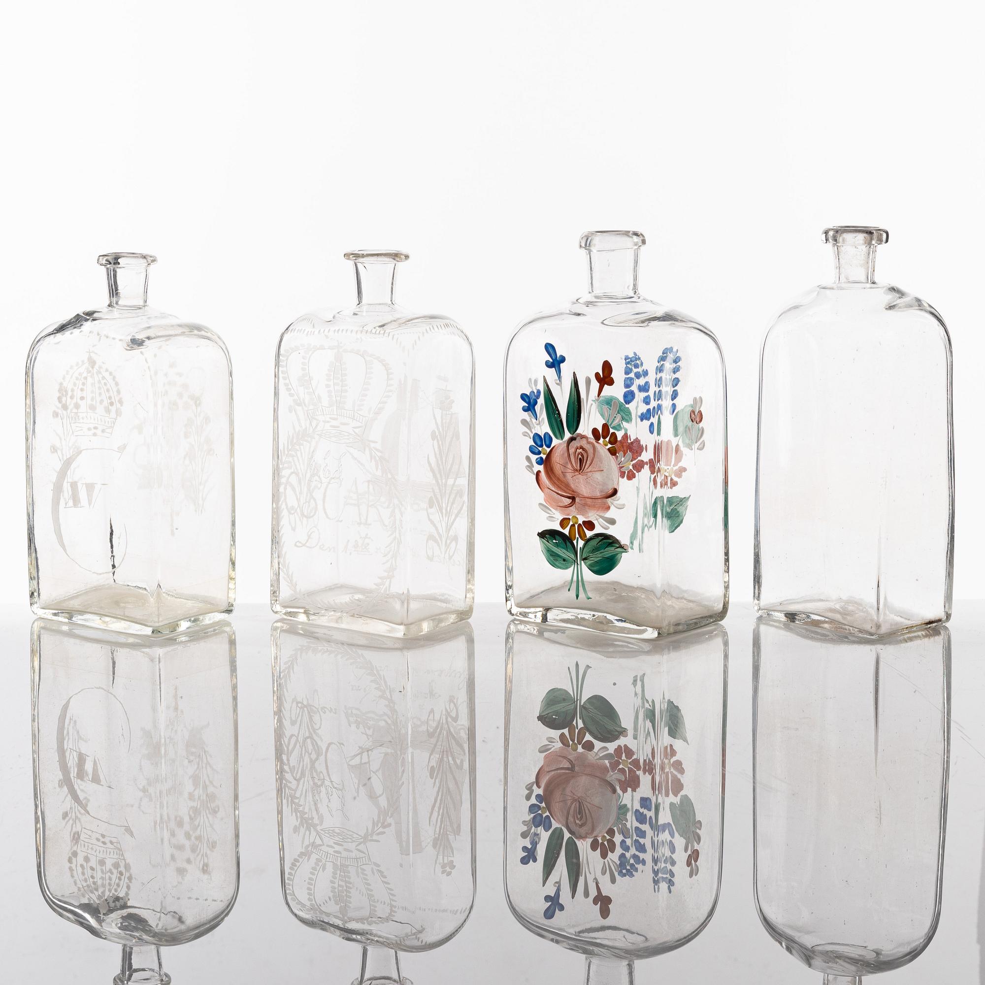 A set of seven glass bottles, 19th Century/circa 1900.