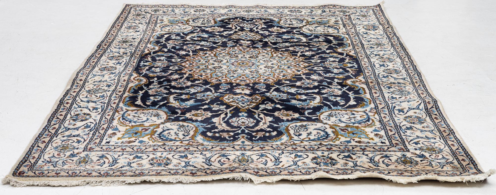 A Nain carpet, Central Persia, c. 300 x 195 cm.
