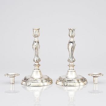 A pair of Rococo candlesticks by Stephen (Friedrich) T. Lemair, (privilge in Stockholm 1762), 1763.