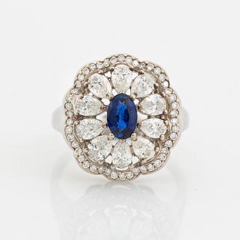 Sapphire and pear and brilliant cut diamond ring.