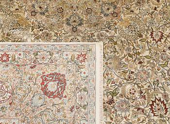 A oriental silk carpet, 350 x 247 cm.