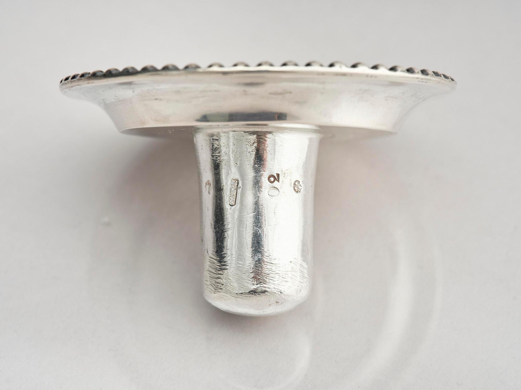 A pair of 18th century silver candlesticks, marks of Simson Ryberg, Stockholm 1789.