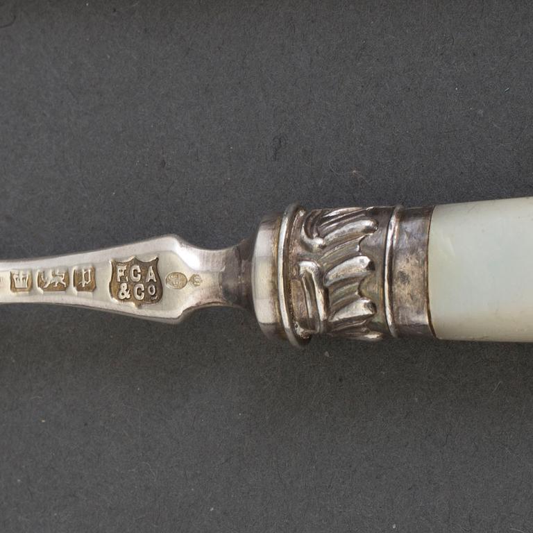 A set of 24 silver and mother of pearl cutlery by  Frederick C. Asman & Co, Sheffield, England, 1907.