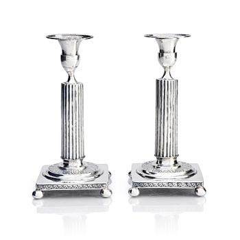 278. A pair of Gustavian silver candlesticks, unclear maker's mark, the cuffs with mark of Pehr Zethelius, Stockholm 1796.