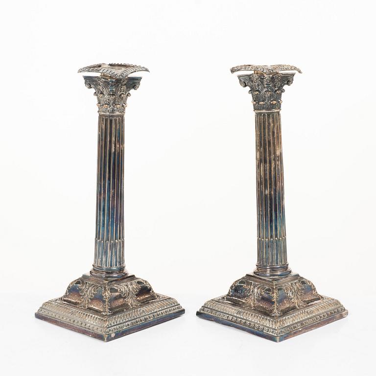 A pair of silver plate candlesticks, no marks, 20th century.