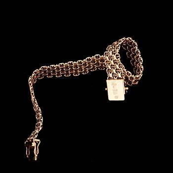 ARMBAND, guld 18k, Stockholms Stads Arbetsvårdsbyrå, Stockholm med otydlig årtalsbokstav. Vikt ca 21 gram.
