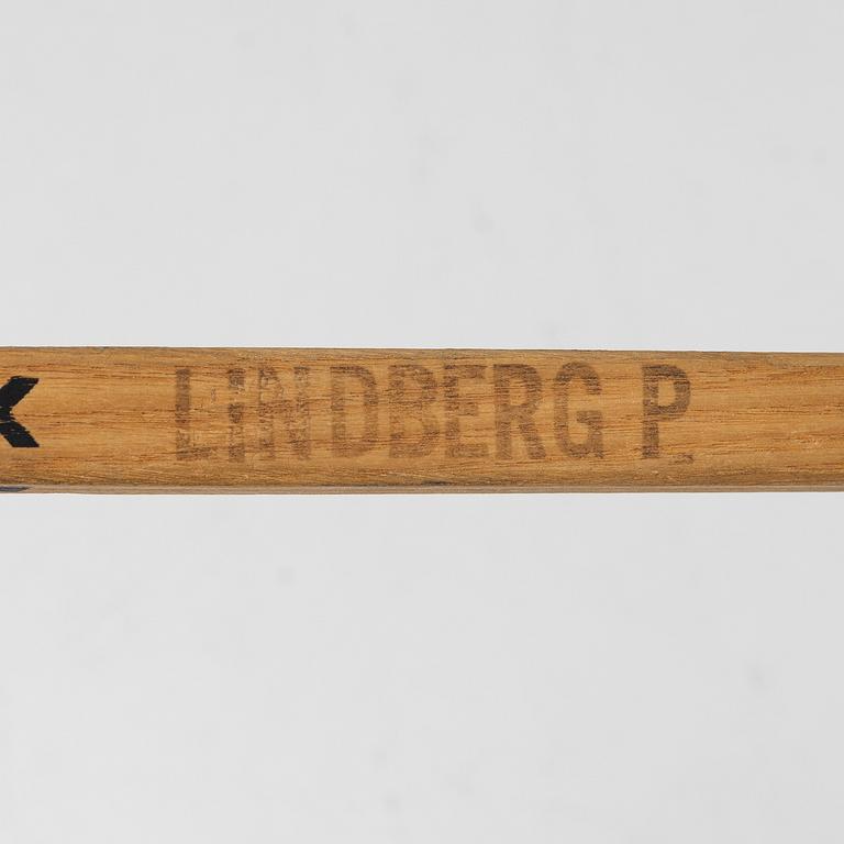 Pelle Lindberg's goaltender stick with autographs.