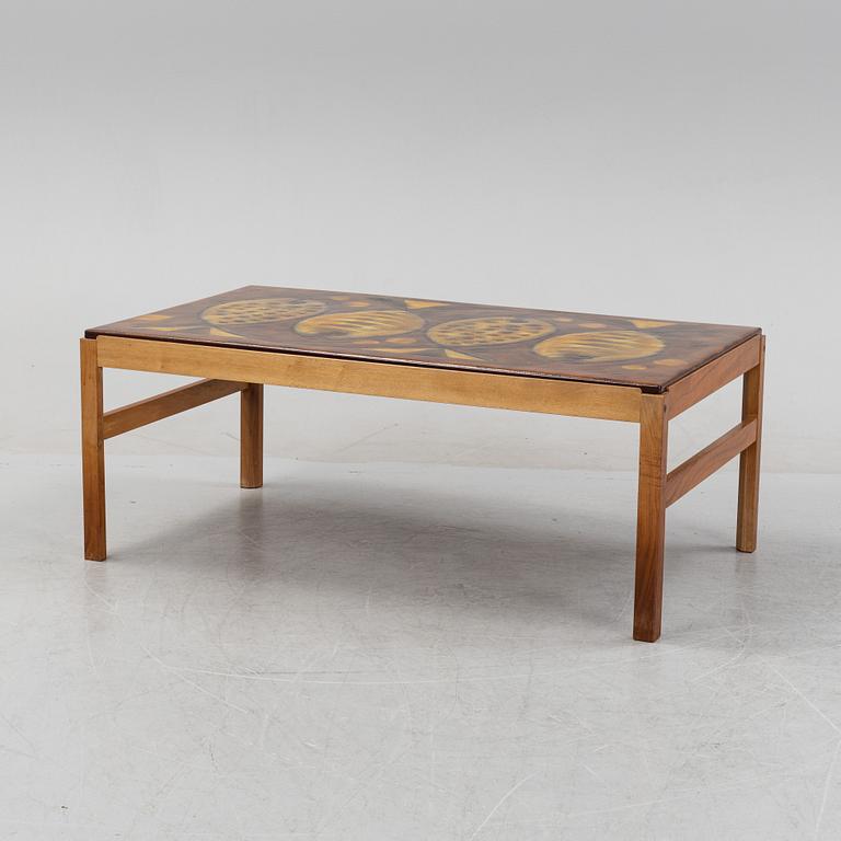 A walnut coffee table, 1960's/1970's, signed Baco.