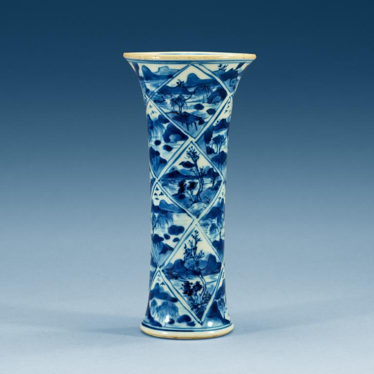 A blue and white Gu shaped vase, Qing dynasty, Kangxi (1662-1722).