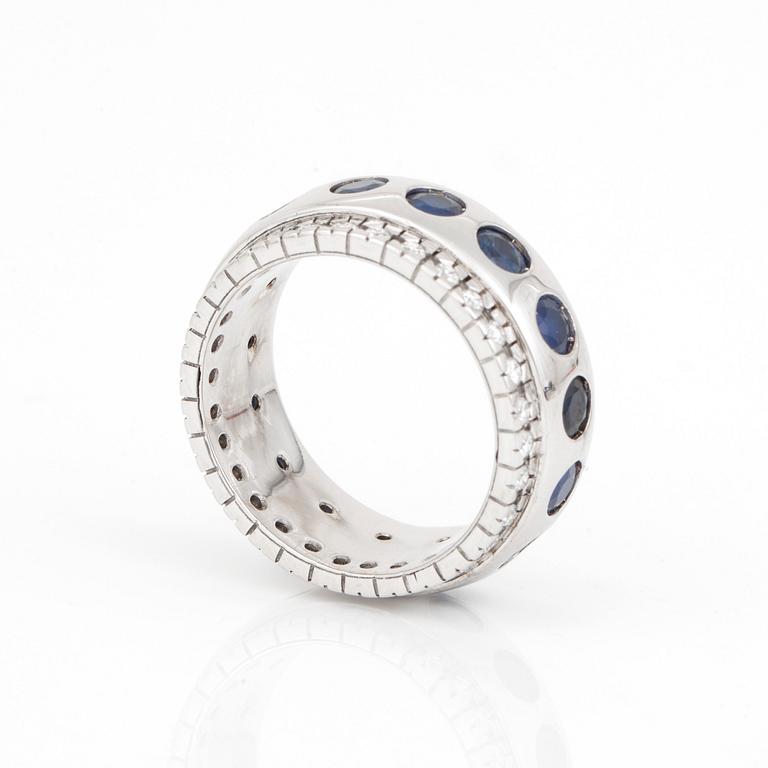 RING, 14K vitguld med safirer totalt ca 3.32 ct och diamanter totalt ca 0.48 ct. Vikt 11,2 gram.
