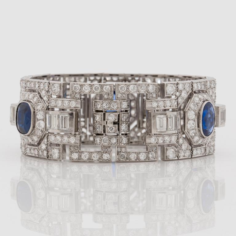 An Art Deco old- and baguette- cut diamond and sapphire cuff bracelet.