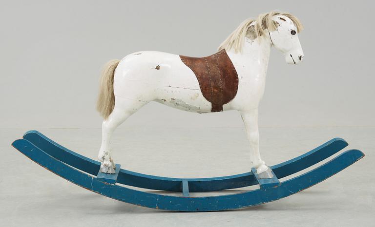 GUNGHÄST, omkring sekelskiftet 1900.