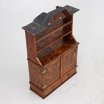 A late Baroque wall cabinet with shelves, first half of the 18th century.