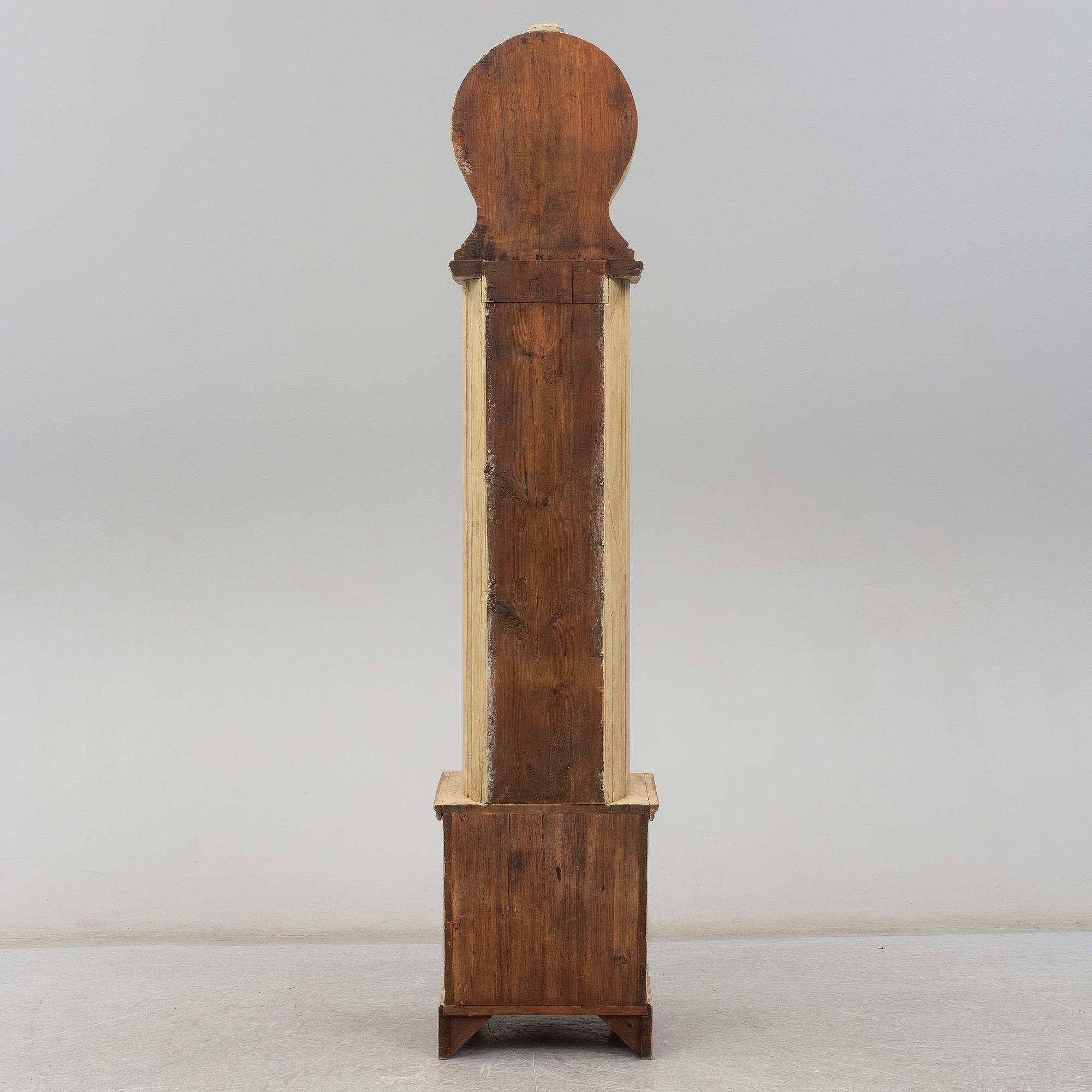 A 19th Century long case clock.