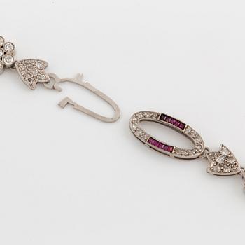 A platinum necklace set with old- and eight-cut diamonds with a total weight of ca 9.50 cts and carré-cut rubies.