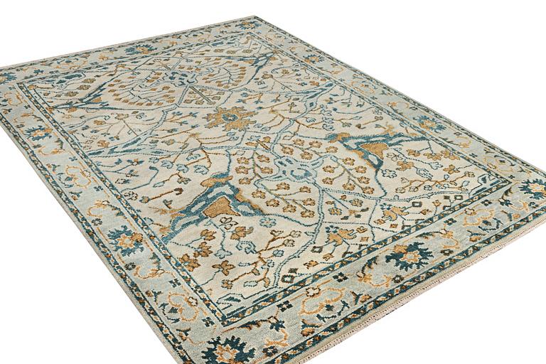 An oriental carpet with Mamluk design, c. 302 x 234 cm.