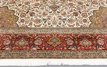 A part silk Tabriz carpet, sk 50 Radj, ca 312 x 296 cm.