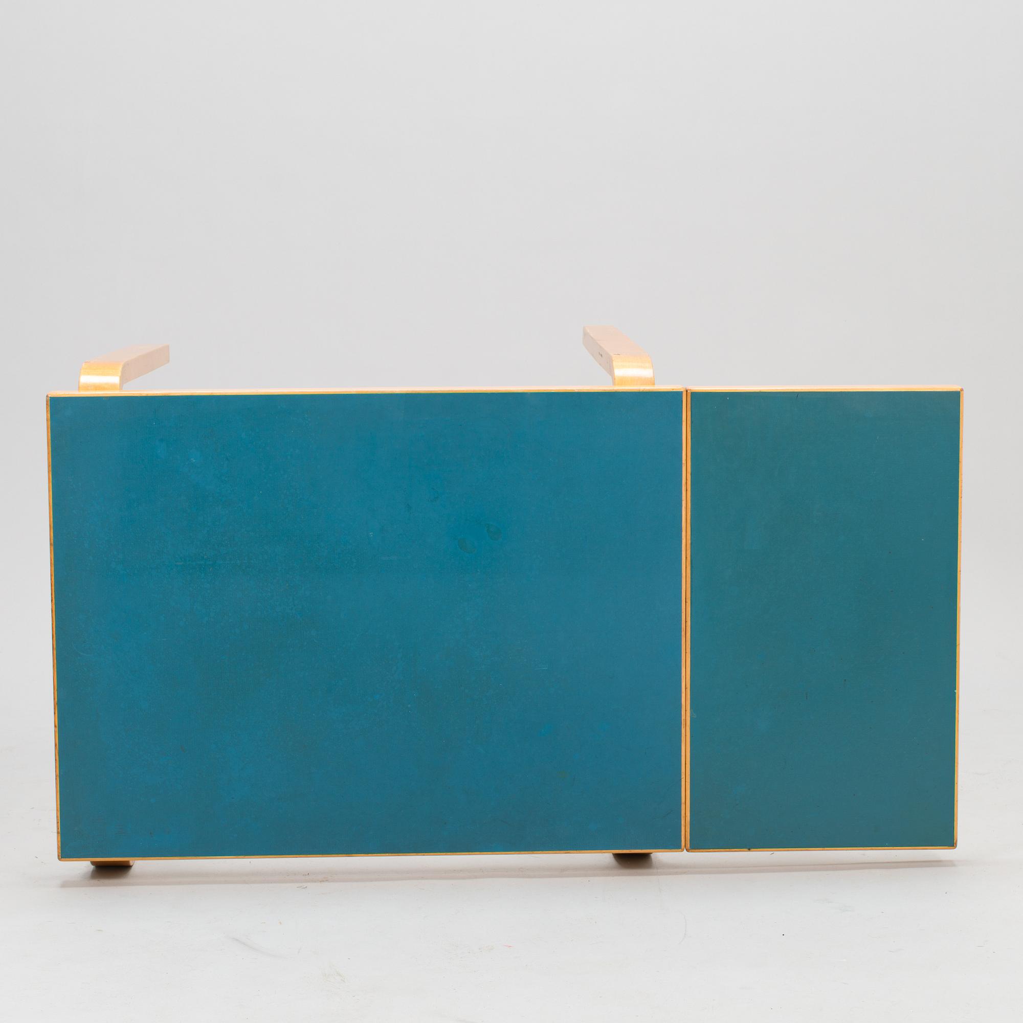 ALVAR AALTO, A mid-20th century drop leaf table for Artek Finland.