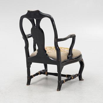 A painted rococo armchair, mid 18th Century.