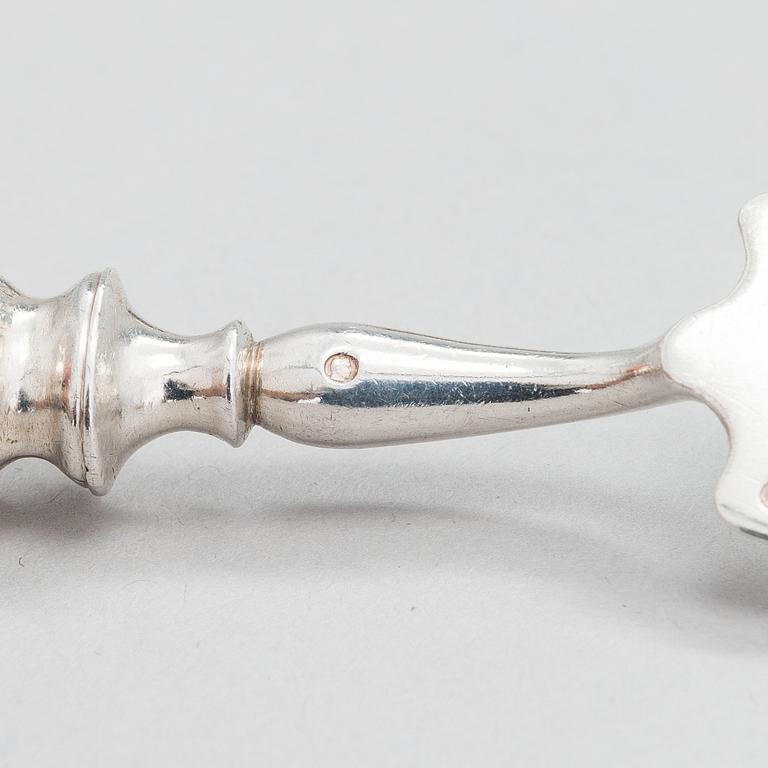 Four pieces of Russian silver cutlery.